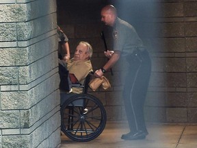 FILE - In this April 20, 2015, file photo, Robert Gentile is brought into the federal courthouse in a wheelchair for a continuation of a hearing in Hartford, Conn. Gentile, a reputed Connecticut mobster who authorities say is the last surviving person of interest in the largest art heist in U.S. history, is set to be sentenced on unrelated weapons convictions. He is scheduled to be sentenced Tuesday, Sept. 5, 2017, in federal court in Hartford. (Cloe Poisson/The Courant via AP, File)