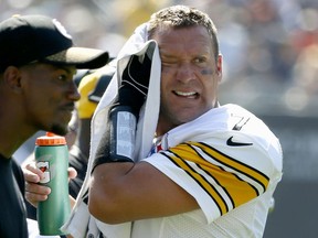 Pittsburgh Steelers quarterback Ben Roethlisberger (7) wipes his face on the sideline during the first half of an NFL football game against the Chicago Bears, Sunday, Sept. 24, 2017, in Chicago. (AP Photo/Charles Rex Arbogast)