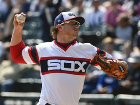 Chicago White Sox starting pitcher Carson Fulmer (51) delivers against the San Francisco Giants during the first inning of a baseball game in Chicago, Sunday, Sept. 10, 2017. (AP Photo/Matt Marton)