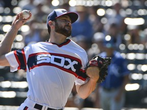 Chicago White Sox starting pitcher Lucas Giolito (27) delivers against the Kansas City Royals during the first inning of a baseball game in Chicago on Sunday, Sept. 24, 2017. (AP Photo/Matt Marton)