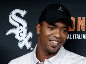 Eloy Jimenez, an outfielder with the Birmingham Barons, a Double-A affiliate of the Chicago White Sox, meets with reporters before a baseball game between the White Sox and the Cleveland Indians on Tuesday, Sept. 5, 2017, in Chicago. (AP Photo/Charles Rex Arbogast)