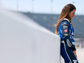 Danica Patrick, driver of the #10 Ford Credit Ford, stands on the grid during qualifying for a NASCAR race on Sept. 2 in Darlington, South Carolina.