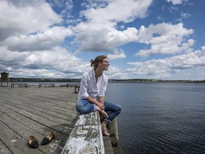 Anika Riopel, who is part of a team pitching a public swimming area for the Halifax Harbour, poses on the waterfront in Halifax on Friday, September 1, 2017. Nova Scotia may be known as Canada's Ocean Playground, but the moniker hardly applies to Halifax harbour. Almost 10 years after the city spent $333 million to clean up its massive, infamously polluted harbour, the two public beaches near its downtown remain strangely quiet -- even on hot, sunny days. Despite monitoring that shows the crystal-clear saltwater is fit to swim in, the city decided this year not to post lifeguards at the Black Rock and Dingle beaches, saying there were so few swimmers last year it didn't make sense to hire rescuers. THE CANADIAN PRESS/Darren Calabrese