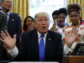 President Donald Trump speaks before signing a memorandum to expand access to STEM, science technology engineering and math, education, in the Oval Office of the White House, Monday, Sept. 25, 2017, in Washington. (AP Photo/Alex Brandon)