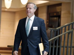 Twitter's Colin Crowell, head of global public policy, arrives for the closed door meeting with the House Intelligence Committee on Capitol Hill, Thursday, Sept. 28, 2017 in Washington. Officials from Twitter are on Capitol Hill as part of the House and Senate investigations into Russian interference in the 2016 elections. (AP Photo/Alex Brandon)