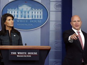 National security adviser H.R. McMaster, right, joined by U.S. Ambassador to the United Nations Nikki Haley points to a reporter during a news briefing at the White House, in Washington, Friday, Sept. 15, 2017. (AP Photo/Carolyn Kaster)