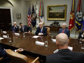 President Donald Trump pauses during a meeting with Congressional leaders and administration officials on tax reform, in the Roosevelt Room of the White House, Tuesday, Sept. 5, 2017, in Washington.