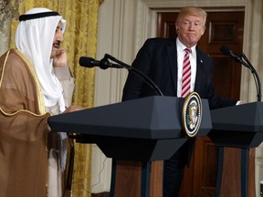 President Donald Trump listens as Kuwait leader Sheikh Sabah Al Ahmad Al Sabah speaks during a news conference in the East Room of the White House, Thursday, Sept. 7, 2017, in Washington. (AP Photo/Evan Vucci)