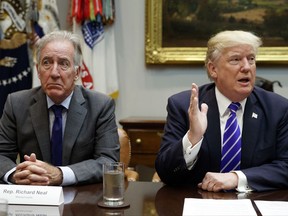 Rep. Richard Neal, D-Mass., listens as President Donald Trump speaks during a meeting with members of the House Ways and Means committee in the Roosevelt Room of the White House, Tuesday, Sept. 26, 2017, in Washington. (AP Photo/Evan Vucci)