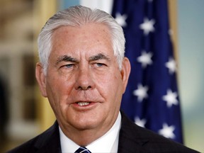 Secretary of State Rex Tillerson answers a question from the media on North Korea, while meeting with the Holy See Secretary for Relations with States Paul Gallagher, Tuesday, Sept. 26, 2017, at the State Department in Washington. (AP Photo/Jacquelyn Martin)
