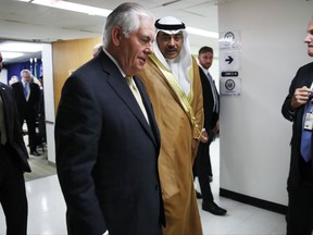 Secretary of State Rex Tillerson, left, walks with Kuwait's Foreign Minister Sheikh Sabah Al-Khale‎d Al-Hamad Al-Sabah, during the U.S.-Kuwait Strategic Dialogue at the State Department, Friday, Sept. 8, 2017, in Washington. (AP Photo/Jacquelyn Martin)