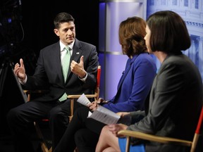 House Speaker Paul Ryan of Wis., left, answers questions during an interview with Julie Pace, AP chief of bureau in Washington; and Erica Werner, AP congressional correspondent, at the Associated Press bureau in Washington, Wednesday, Sept. 13, 2017. (AP Photo/Pablo Martinez Monsivais)