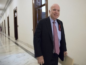 Sen. John McCain, R-Ariz., walks from his Senate office as Congress returns from the August recess to face work on immigration, the debt limit, funding the government, and help for victims of Hurricane Harvey, in Washington, Tuesday, Sept. 5, 2017. Earlier, McCain declared President Donald Trump's decision to phase out an Obama administration program that has protected hundreds of thousands of young immigrants "the wrong approach" at a time when Republicans and Democrats need to work together. (AP Photo/J. Scott Applewhite)