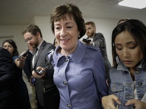 Sen. Susan Collins, R-Maine, is questioned by reporters as she arrives at the Capitol in Washington, Tuesday, Sept. 26, 2017. Collins was a key Republican opponent of the Graham-Cassidy bill, the GOP's latest attempt to repeal the Obama health care law, which was pulled by Senate Majority Leader Mitch McConnell, R-Ky. (AP Photo/J. Scott Applewhite)