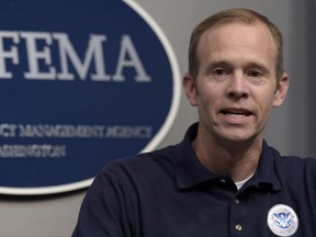 Federal Emergency Management Agency Administrator Brock Long speaks during a briefing on Hurricane Irma at FEMA headquarters in Washington, Friday, Sept. 8, 2017. (AP Photo/Susan Walsh)