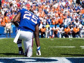 Buffalo Bills running back LeSean McCoy kneels during the national anthem before a game against the Denver Broncos on Sept. 24.