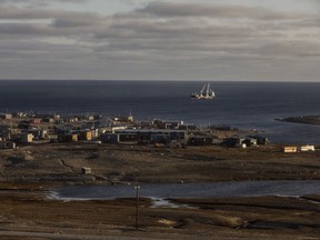 A cargo ship sits in the bay of Gjoa Haven, Nunavut on Friday September 1, 2017. THE CANADIAN PRESS/Jason Franson