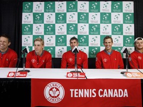 Canada's from left, Daniel Nestor, Denis Shapovalov, Martin Laurendeau, Vasek Pospisil and Brayden Schnur speak during a Davis Cup press conference in Edmonton, Alta., on Tuesday September 12, 2017. Davis Cup rookie Schnur will kick off Canada's playoff against India on Friday before teen phenom Denis Shapovalov takes the court in the second match of the best-of-five tie. THE CANADIAN PRESS/Jason Franson