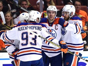 Connor McDavid #97 of the Edmonton Oilers celebrates his power play goal with Mark Letestu #55, Ryan Nugent-Hopkins #93 and Leon Draisaitl #29 to take a 2-0 lead over the Anaheim Ducks during the second period in Game 5 of their Stanley Cup playoff series.