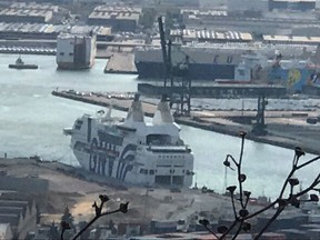 One of the ferry vessels, where authorities are accommodating security officers dispatched to Catalonia ten days ahead of a contested vote on independence, seen docked at the Barcelona port, Spain, Thursday, Sept. 21, 2017.  Spanish security forces' unions say authorities have hired three ferry vessels to accommodate some of the additional civil guard and national police officers to provide security during a contested vote on independence. (AP Photo)