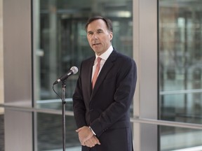Federal Finance Minister Bill Morneau briefs journalists following a meeting with leading private sector economists in Toronto, on Friday January 13, 2017.THE CANADIAN PRESS/Chris Young ORG XMIT: CHY102