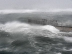 A rough surf surrounds Boynton Beach inlet as Hurricane Irma hits in Boynton Beach, Fla. (Jim Rassol/South Florida Sun-Sentinel via AP)