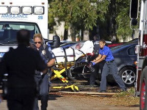 FILE - In this Wednesday, Sept. 13, 2017 file photo, a woman is transported from The Rehabilitation Center at Hollywood Hills as patients are evacuated after a loss of air conditioning due to Hurricane Irma in Hollywood, Fla. After 11 nursing home residents died in the sweltering heat of hurricane-induced power outages, Florida's nursing home industry is now on a collision course with Gov. Rick Scott. Days after Hurricane Irma ravaged the state, Scott used his emergency powers to put in place new rules that require nursing homes and assisted living facilities to have generators capable of providing backup power for four days. The Republican governor, who normally brags about eliminating regulations on businesses, gave nursing homes 60 days to comply. Nursing home officials say they can't. (Amy Beth Bennett/South Florida Sun-Sentinel via AP, File)