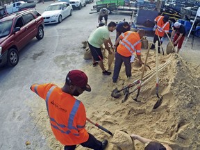 Residents fill up sandbags Thursday, Sept. 7, 2017, in Orlando, Fla., as they prepare for Hurricane Irma. Long lines of vehicles waited for hours to get a 10 sandbag limit at the City of Orlando Public Works. (Red Huber/Orlando Sentinel via AP)