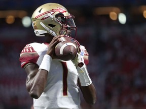 FILE - In this Sept. 2, 2017, file photo, Florida State quarterback James Blackman warms up before an NCAA college football game against Alabama in Atlanta.  The Seminoles are expected to start Blackman at quarterback against North Carolina State on Saturday. (Joe Rondone/Tallahassee Democrat via AP, File)