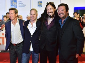 The Tragically Hip, from left, Gord Sinclair, Johnny Fay, Rob Baker and Paul Langlois arrive on the red carpet for the movie "Long Time Running" during the 2017 Toronto International Film Festival in Toronto on Wednesday, September 13, 2017. THE CANADIAN PRESS/Frank Gunn