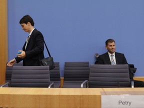 Frauke Petry, co-chairwoman of the AfD, leaves a press conference of the Alternative for Germany, AfD, in Berlin, Germany, Monday, Sept. 25, 2017, where she declared that she won't be part of the party's parliament faction on the day after the nationalist party was elected first time into the German parliament. (AP Photo/Markus Schreiber)