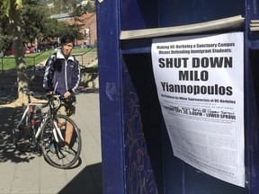In this Sept. 21, 2017 photo, a group has put up flyers and a booth on Sproul Plaza calling for protesters to "Shut Down Milo Yiannopoulos," at the University of California, Berkeley campus in Berkeley, Calif. Right-wing showman Milo Yiannopoulos is holding a "Free Speech Week" at the University of California, Berkeley with a planned lineup including conservative firebrands Steve Bannon and Ann Coulter. The university says it has no confirmation the headline acts will appear but is preparing strong security to head off any more violent protests at the liberal campus. (AP Photo/Jocelyn Gecker)
