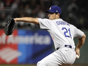 Los Angeles Dodgers starting pitcher Yu Darvish throws to a San Francisco Giants batter during the first inning of a baseball game Wednesday, Sept. 13, 2017, in San Francisco. (AP Photo/Marcio Jose Sanchez)