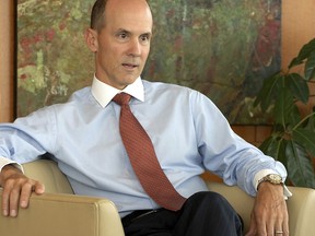 FILE - In this May 30, 2007, file photo, Equifax CEO Richard Smith poses for a photo at the Equifax headquarters in Atlanta. On Tuesday, Sept. 26, 2017, credit reporting agency Equifax ousted CEO Smith in an effort to clean up the mess left by a damaging data breach that exposed highly sensitive information about 143 million Americans. (Joey Ivansco/Atlanta Journal-Constitution via AP, File)