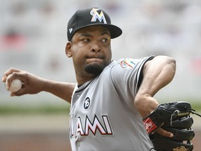 Miami Marlins' Odrisamer Despaigne pitches during the first inning of a baseball game against the Atlanta Braves, Sunday, Sept. 10, 2017, in Atlanta. (AP Photo/John Amis)