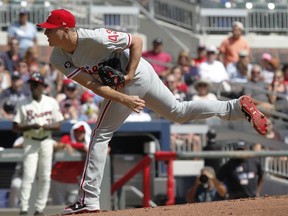 Philadelphia Phillies starting pitcher Nick Pivetta throws against the Atlanta Braves in the first inning of a baseball game in Atlanta, Sunday, Sept. 24, 2017. (AP Photo/Tami Chappell)