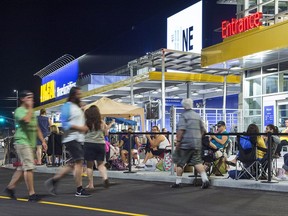 Eager shoppers prepare to camp out overnight at the new IKEA store in Dartmouth, N.S. on Tuesday evening, Sept. 26, 2017. The popular Swedish furniture chain's new Halifax-area location is set to open Wednesday morning. THE CANADIAN PRESS/Andrew Vaughan