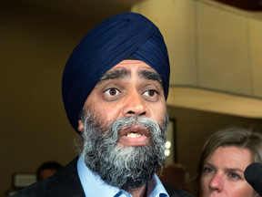 National Defence Minister Harjit Sajjan:” Rest assured, we cannot do future business with a company that is threatening us.”