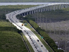 Motorists head north on US 1, Wednesday, Sept. 6, 2017, in Key Largo, Fla., in anticipation of Hurricane Irma