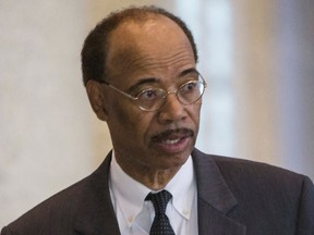 Former U.S. Rep. Mel Reynolds leaves the Dirksen Federal Courthouse after a judge convicted Reynolds on charges he failed to file tax returns for income he made while in Africa consulting for Chicago businessmen Thursday, Sept. 28, 2017 in Chicago. He faces a maximum sentence of four years in prison and a $1 million fine. (James Foster/Chicago Sun-Times via AP)