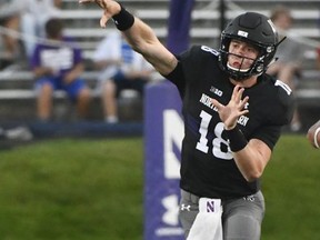 Northwestern quarterback Clayton Thorson (18) throws a pass against Bowling Green during the first half of an NCAA college football game in Evanston, Ill., Saturday, Sept. 16, 2017. (AP Photo/Matt Marton)
