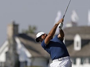 Jason Day hits his second shot on the third hole during the second round of the BMW Championship golf tournament at Conway Farms Golf Club, Friday, Sept. 15, 2017, in Lake Forest, Ill. (AP Photo/Nam Y. Huh)