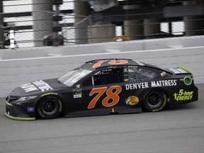Martin Truex Jr., drives during the NASCAR Cup auto race at Chicagoland Speedway in Joliet, Ill., Sunday, Sept. 17, 2017. (AP Photo/Nam Y. Huh)