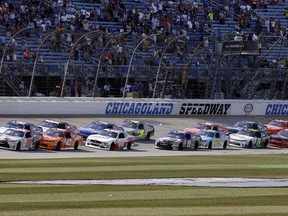 Drivers cross the starting line during the NASCAR Xfinity Series auto race at Chicagoland Speedway in Joliet, Ill., Saturday, Sept. 16, 2017. (AP Photo/Nam Y. Huh)