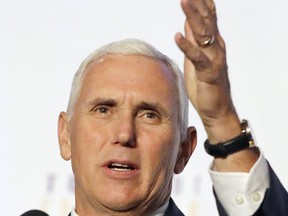 FILE - In this file photo taken on Friday, Aug. 11, 2017, Vice President Mike Pence speaks during the Indianapolis Ten Point Coalition luncheon in Indianapolis. Vice President Pence will make the Republican case for a federal tax code overhaul during a speech Friday, Sept. 22 in his home state of Indiana.(AP Photo/Darron Cummings, File)