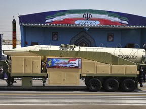 Iran's Khoramshahr missile is displayed by the Revolutionary Guard during a military parade marking the 37th anniversary of Iraq's 1980 invasion of Iran, in front of the shrine of late revolutionary founder Ayatollah Khomeini, just outside Tehran on Friday Sept. 22, 2017.