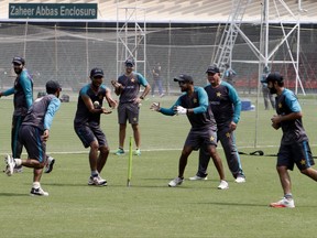 Pakistani cricket players take part in net practice for the upcoming World XI series at Gaddafi stadium in Lahore, Pakistan, Friday, Sept. 8, 2017. The series is aimed at reviving international cricket in Pakistan, since terrorists attacked the Sri Lanka cricket team bus in Lahore in 2009. (AP Photo/K.M. Chaudary)