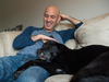 Ian Falzon and Jagger relax on the couch at their home in Newcastle, Ont. âHow canât you love this guy?â Falzon says.