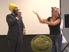 An online video shows a woman approaching Singh immediately after he starts speaking and accusing him of being 'in bed with Sharia (law)' and the Muslim Brotherhood. In fact, Singh is Sikh, not Muslim