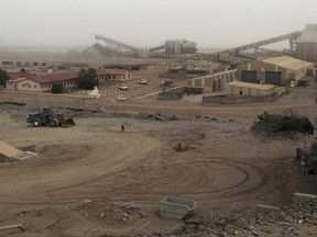 This photo taken Tuesday, June 13, 2017 shows diamond mine facilities in the town of Oranjemund, Namibia. Relic from the wreck of a 16th century Portuguese ship that was discovered in the area on Namibia's Atlantic coast are kept in a warehouse at the diamond mine, and plans to open a museum to display some of the artefacts are moving slowly. (AP Photo/Chris Torchia)